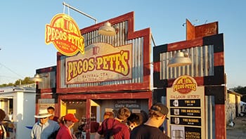 Pecos Pete's western themed soda booth at an outdoor festival as a vendor.